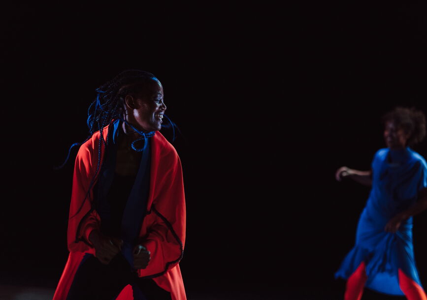 Choreographer and performer Dorothée Munyaneza dances and sings with a fellow artist in Mailles.